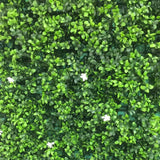 Blossoming summer artificial green wall